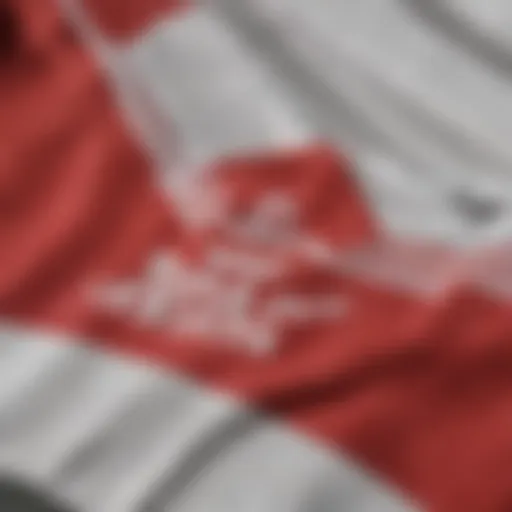 A close-up of the Adidas red and white t-shirt showcasing its fabric texture