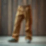 Stylish Bootcut Cargo Pants A stylish pair of bootcut cargo pants displayed on a wooden surface