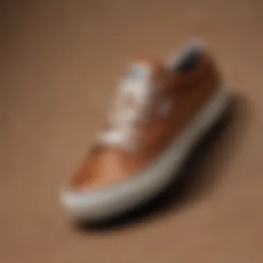 A close-up view of textured brown canvas sneakers highlighting their material composition