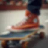 Classic Chuck Taylor leather high tops on a skateboard
