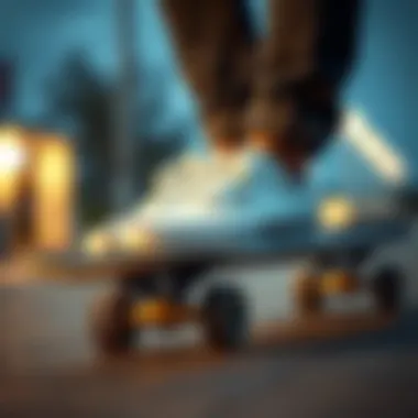 A stylish pair of white low top Vans on a skateboard