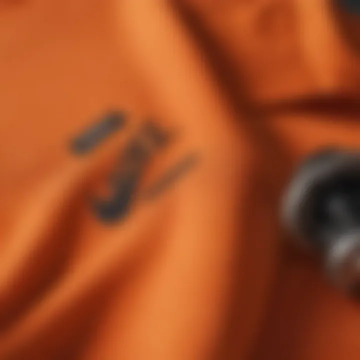 Close-up of the orange Nike shirt showcasing its design elements