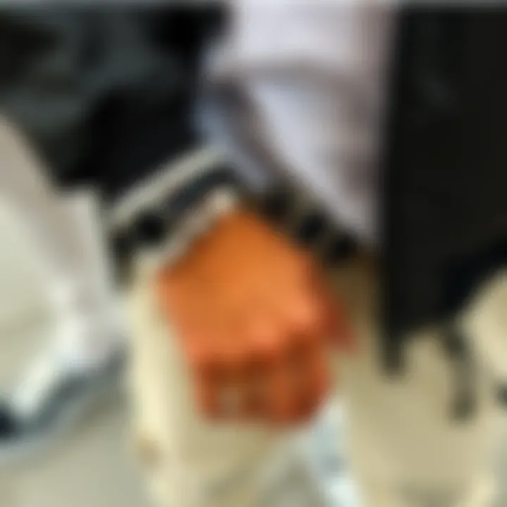 Fashionable Display of Black and White Bracelets Stylish individual wearing black and white bracelets in a fashionable manner