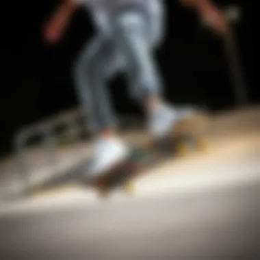 A skater performing a trick while wearing all-white Vans