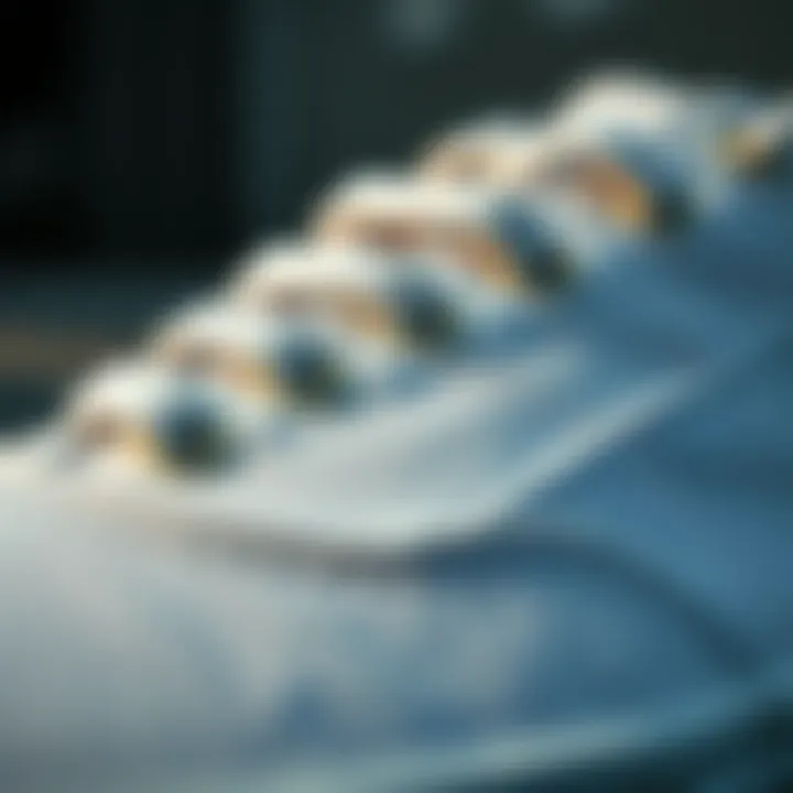 Close-up of the texture and design of all-white Vans shoes