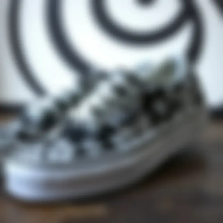 Floral Pattern Detail on Black and White Vans Close-up view of the floral pattern on Vans sneakers with contrasting background