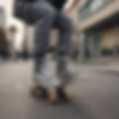 Skater performing a trick while wearing gray Vans