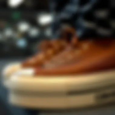 Close-up of brown low top platform Converse showcasing material details