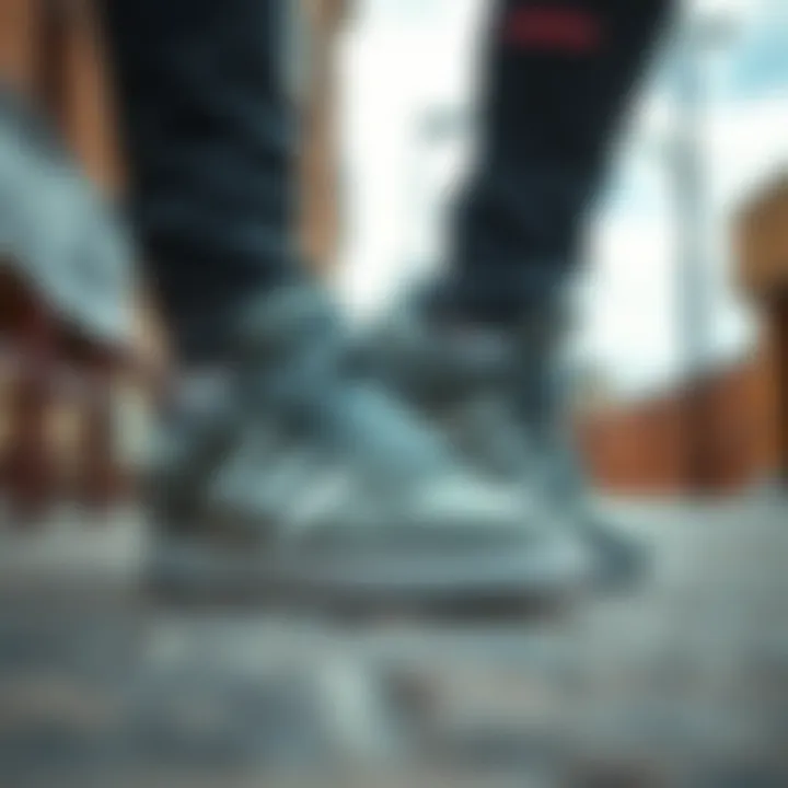 Grey Adidas skate shoes paired with casual streetwear