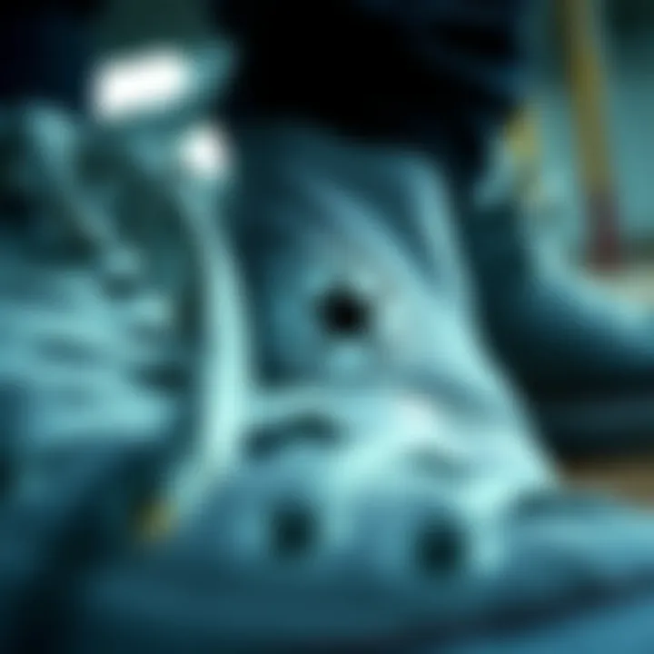 Close-up of the design details of grey Converse shoes