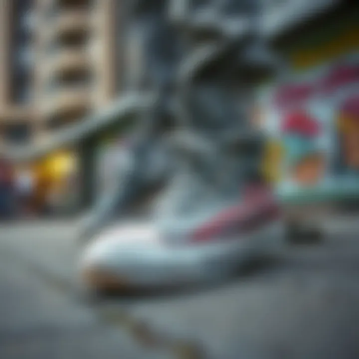 Grey high top Converse worn in an urban skateboarding setting