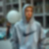 A stylish grey Mike hoodie showcased in an urban skatepark setting