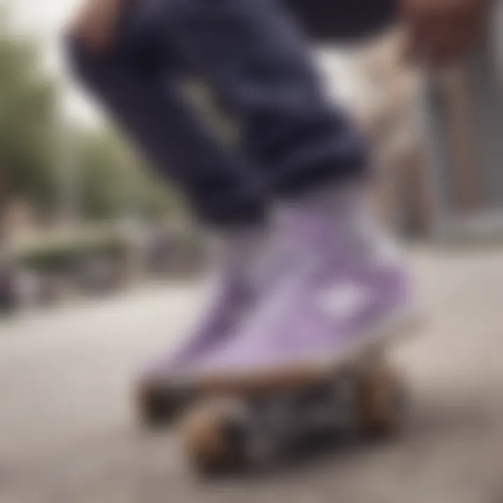 Skateboarder wearing Lavender New Balance sneakers in action