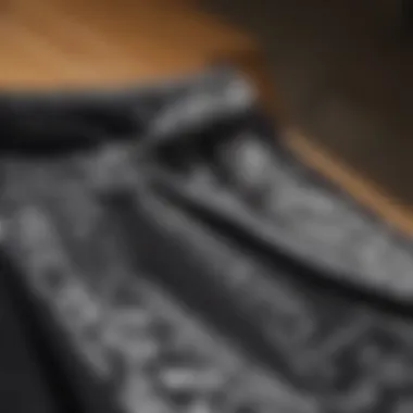 Close-up of the fabric and design of black bandana shorts