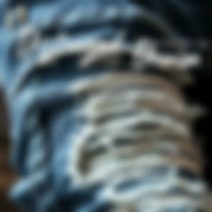 Artistry in Distressed Denim Close-up of distressed denim highlighting unique stitching and texture