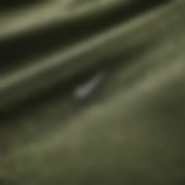 Close-up of olive green Nike shorts showcasing the fabric texture and stitching details