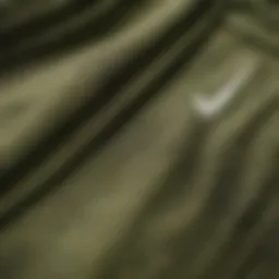 Close-up of olive green Nike shorts showcasing fabric texture