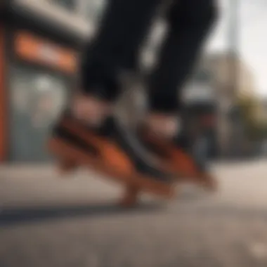 Skater performing trick with Puma Suede Black and Orange