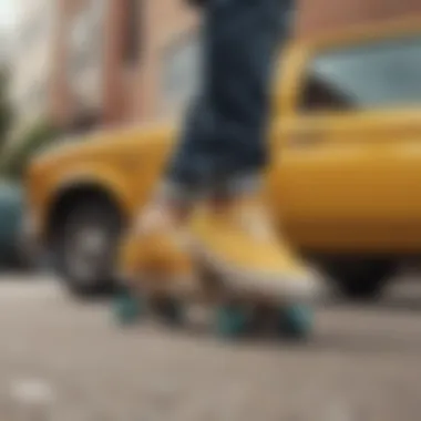 A skateboarder performing tricks in mustard yellow slip-on Vans against an urban backdrop