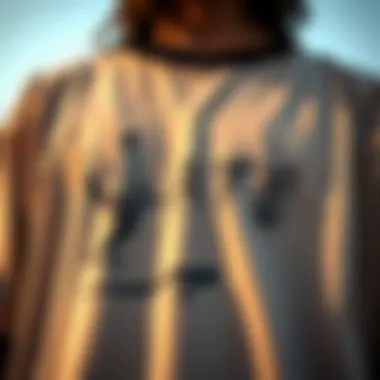 Artistry in Skate Culture Attire Close-up of an oversized t-shirt with skateboard graphics