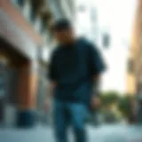 Skateboarder showcasing oversized t-shirt in urban setting