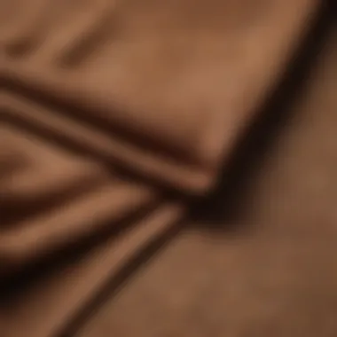 Close-up of fabric texture highlighting the quality of the brown sweatshirt