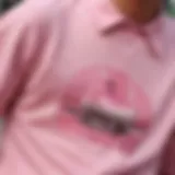 Close-up of a pink graphic shirt featuring unique artwork