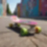 A colorful penny board resting on a vibrant street with graffiti art
