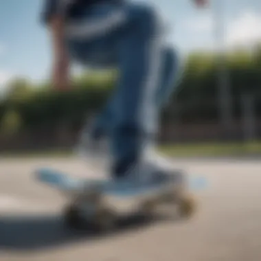 Skateboarder performing tricks wearing Adidas with blue stripes