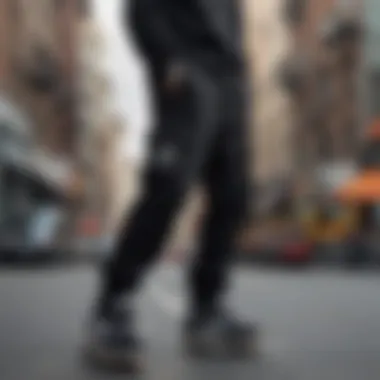 Stylish black sweatpants displayed in a modern urban environment