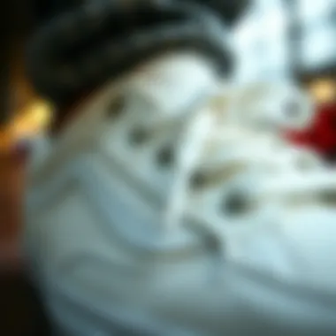 Close-up of Vans white canvas sneaker detailing