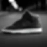 Nike Court Vision Mid in black and white showcasing side profile