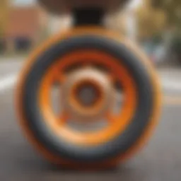 Close-up view of orange skateboard wheels highlighting texture and design