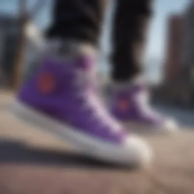 Black and purple Converse high tops styled with skate gear