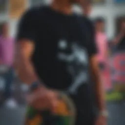 A black t-shirt featuring a unique skateboarding graphic.