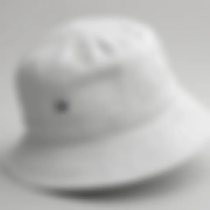 Close-up of the fabric texture of a white bucket hat.