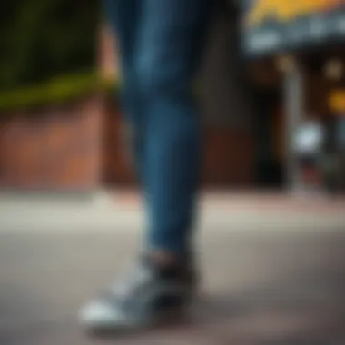 Casual outfit featuring dark blue jeans and sneakers