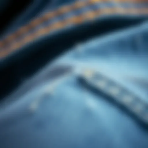 Textured Aged Denim Fabric Close-up of aged denim fabric showcasing texture and wear