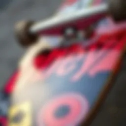 Close-up of a skateboard adorned with Obey logos and vibrant graphics.